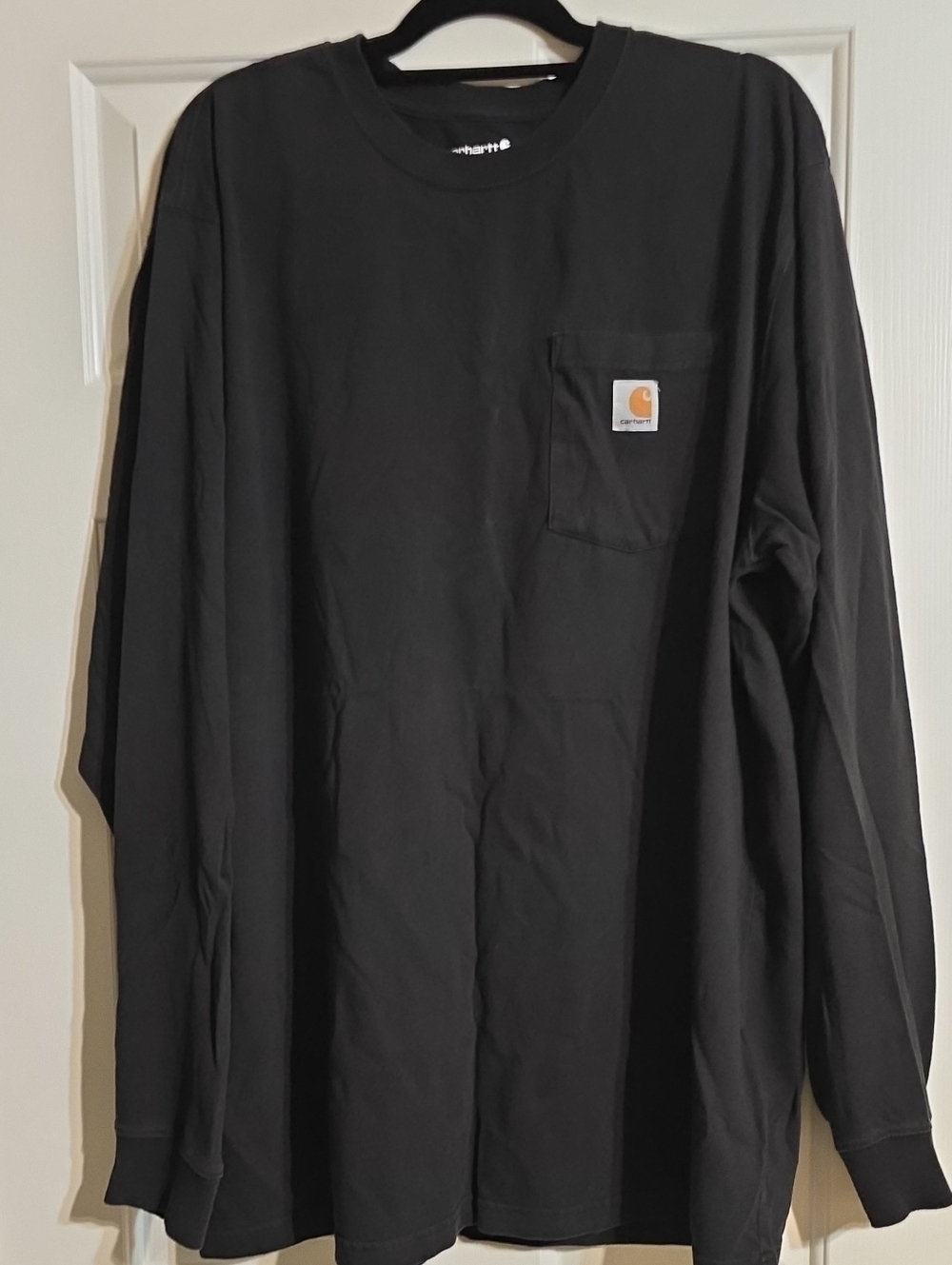 Carhartt Loose Fit Long-Sleeve Pocket Tee in Black with Logo Patch